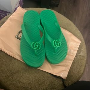 Gucci flip flops.